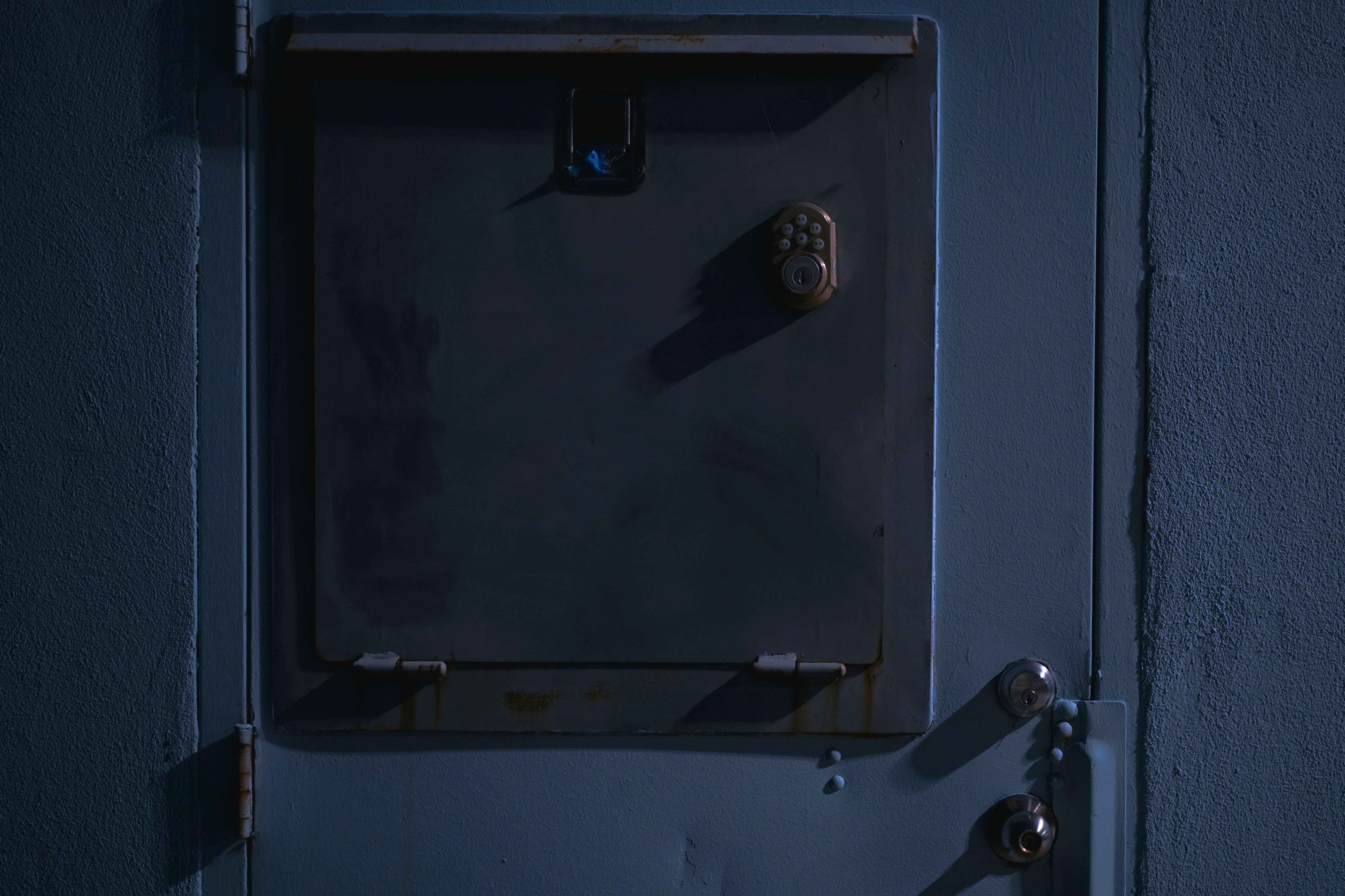 Locked metal door representing trust and security in fintech UX